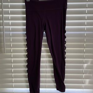 Athleta 7/8 purple leggings with laced up legs.